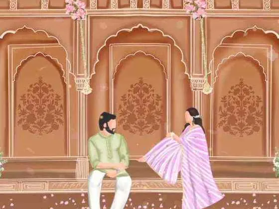 A couple in a Rajasthani palace courtyard with carved arches